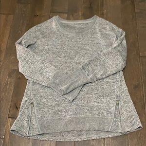 Athletic top with side zippers